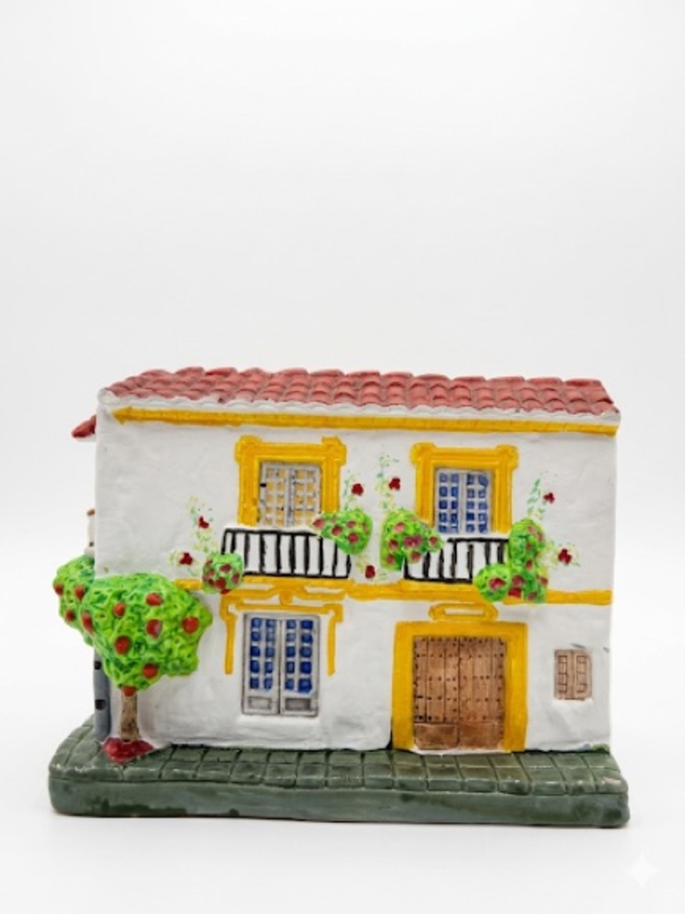 White and Yellow Ceramic House Sculpture with Red Roof